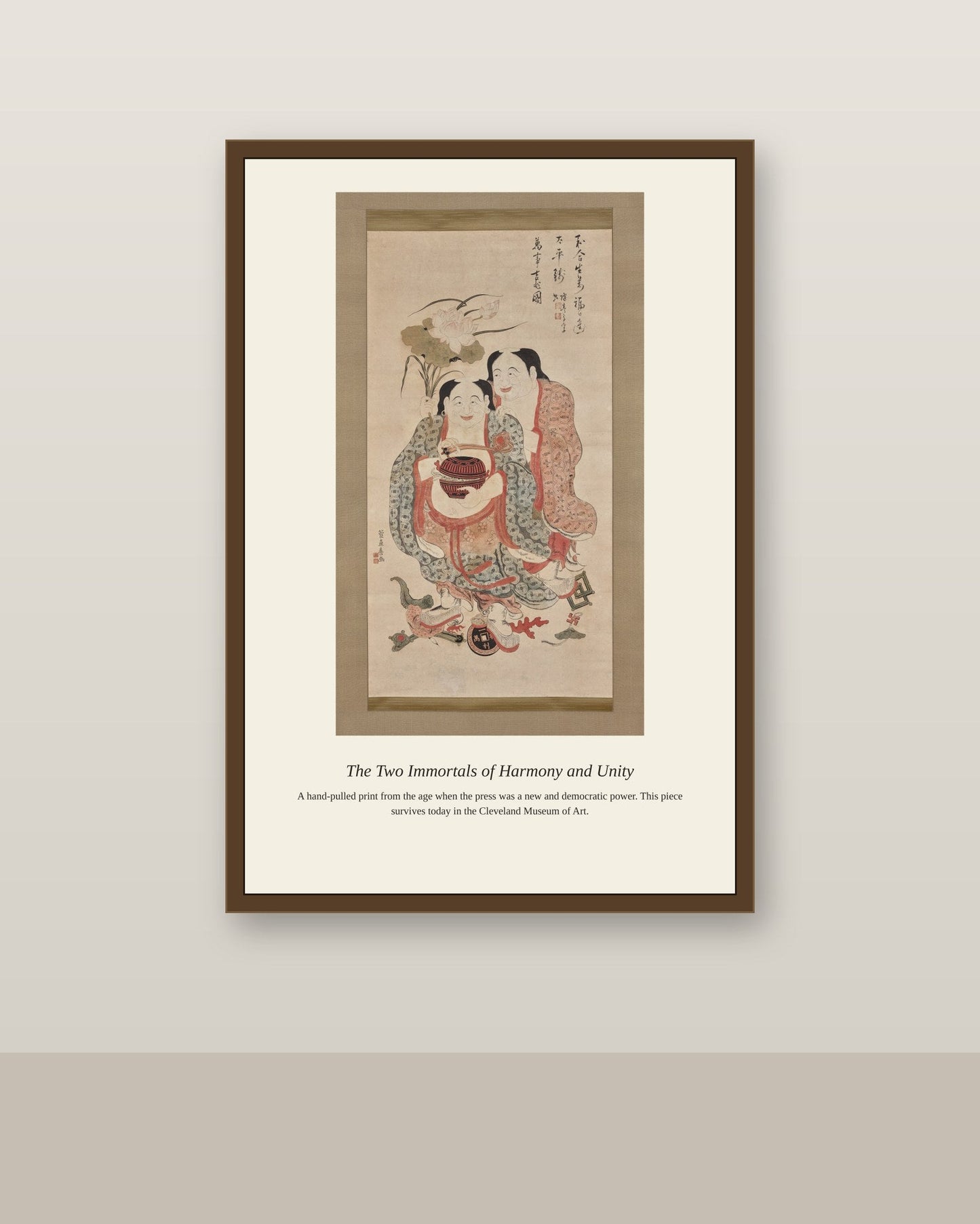 The Two Immortals of Harmony and Unity antique religious art print shown framed on a wall in a styled room