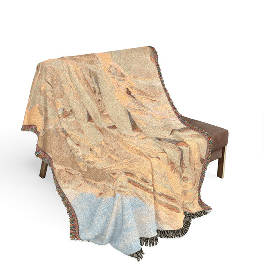 Abu Simbel throw blanket draped over bench sandy beige Egyptian temple imagery blue sky lower fringe