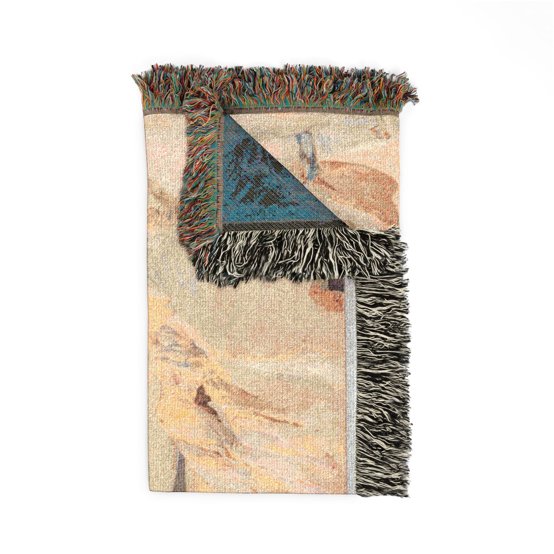 Abu Simbel woven throw blanket folded sandy beige front Egyptian temple and teal reverse multicolor fringe