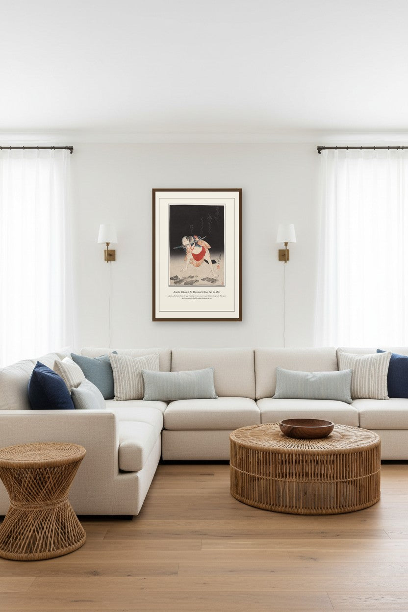 Kabuki actor print framed on a wall between two sconces in a coastal-style living room