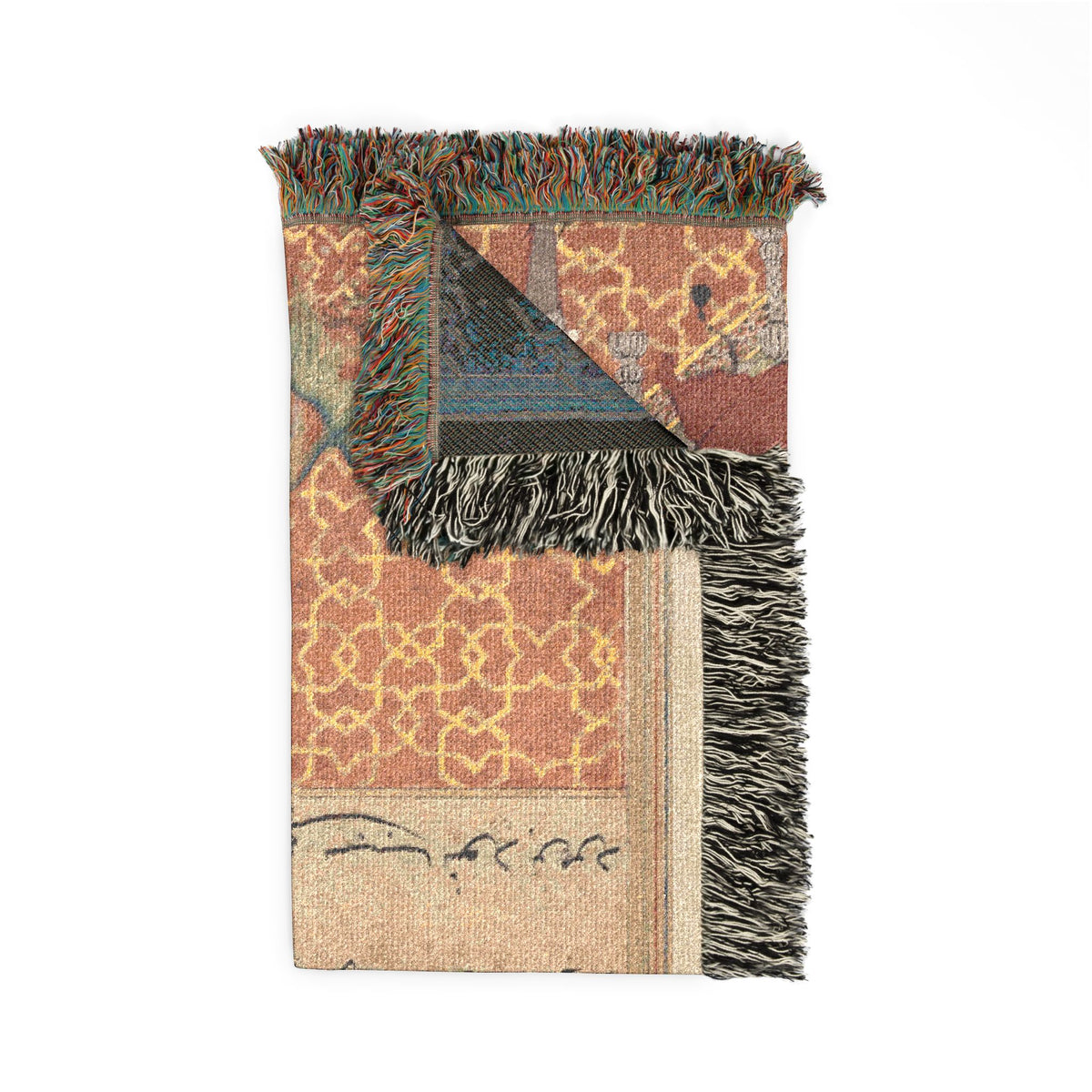 Bird of Seven Colors throw blanket folded, vivid front bird scene and corner of the muted reverse with fringe