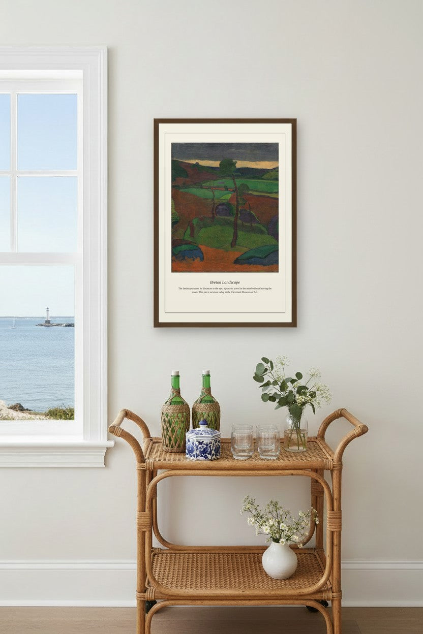 Breton Landscape print framed above a beige sectional sofa between wall sconces