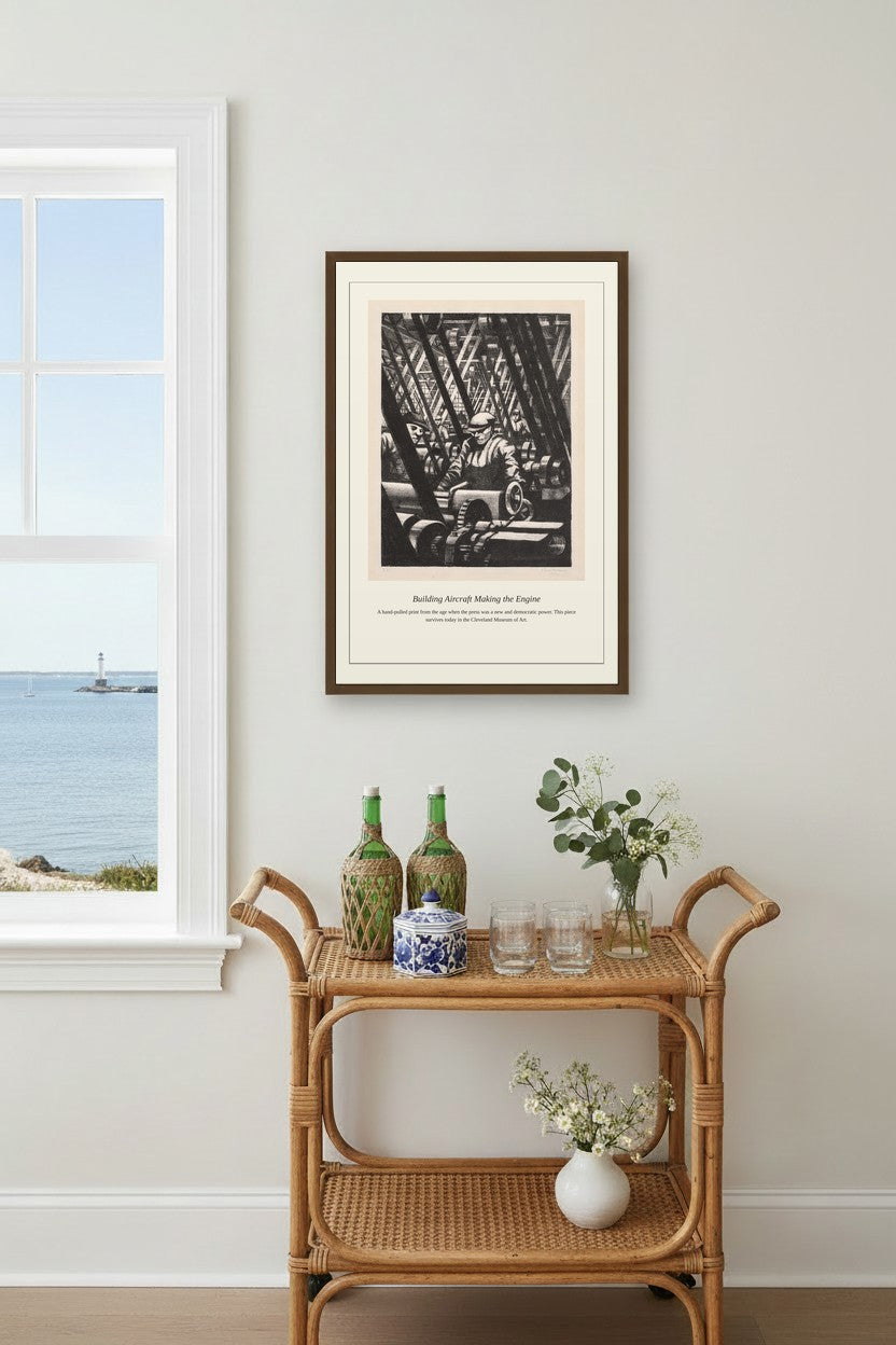 framed aircraft engine factory engraving above a rattan bar cart near a window overlooking the sea