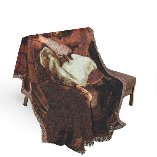 Cardinal Guillaume Dubois Woven Throw Blanket draped over wooden bench, portrait detail visible, fringe cascading