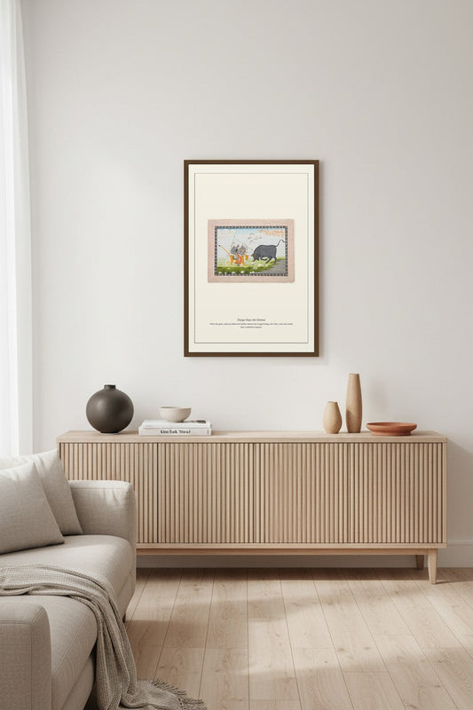 Durga art print framed above a light wood console