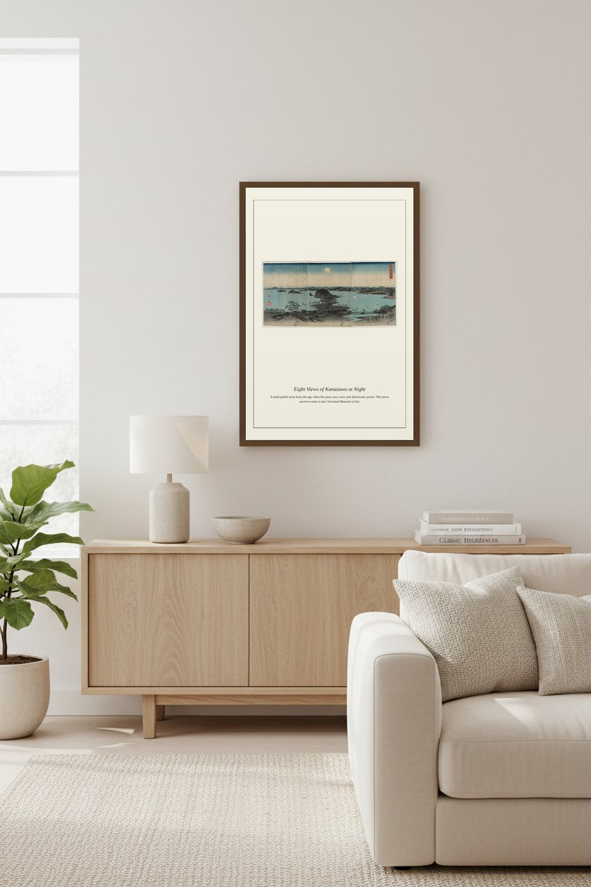 Eight Views of Kanazawa at Night print framed above a low sideboard in a bright living room