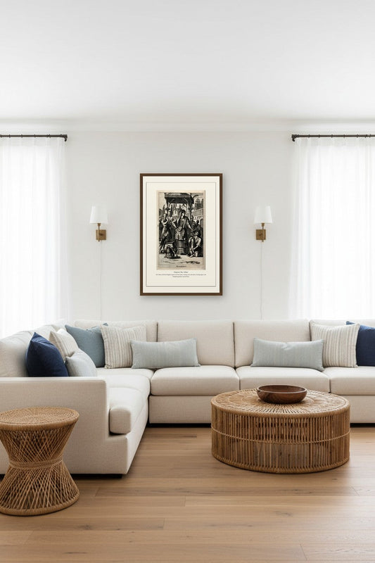 Empress Nur Jahan print framed between wall sconces above a light sectional sofa