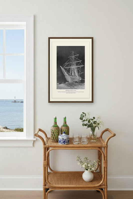 Endurance in the Ice photograph framed above a coastal bar cart with green bottles