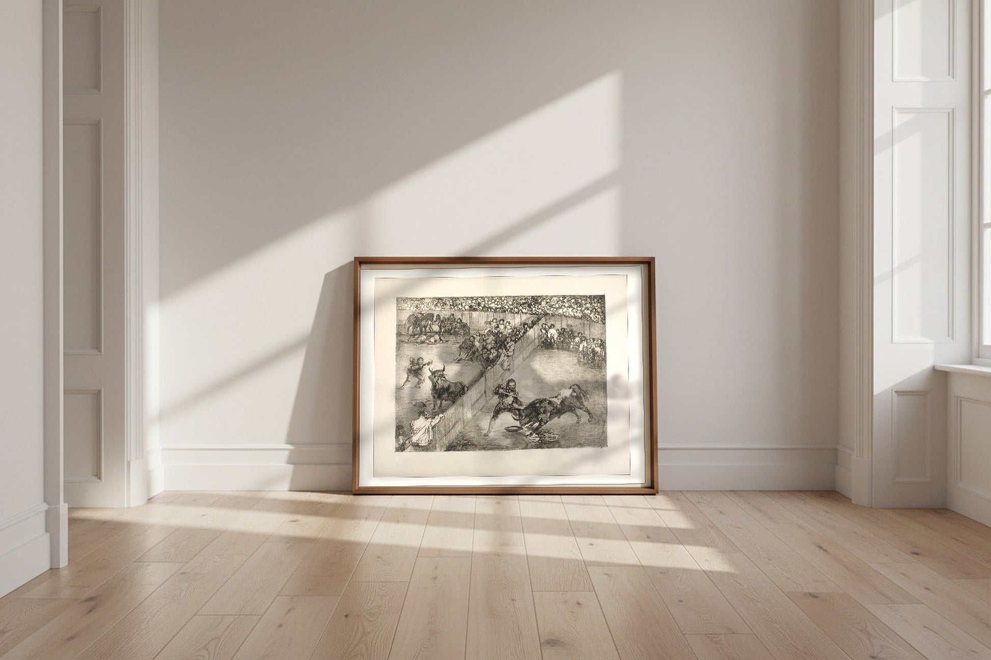 Bullfight in a Divided Ring — Francisco de Goya Fine Art Poster shown framed and leaning against a wall in a sunlit room