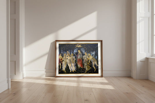 Primavera — Sandro Botticelli Fine Art Poster shown framed and leaning against a wall in a sunlit room
