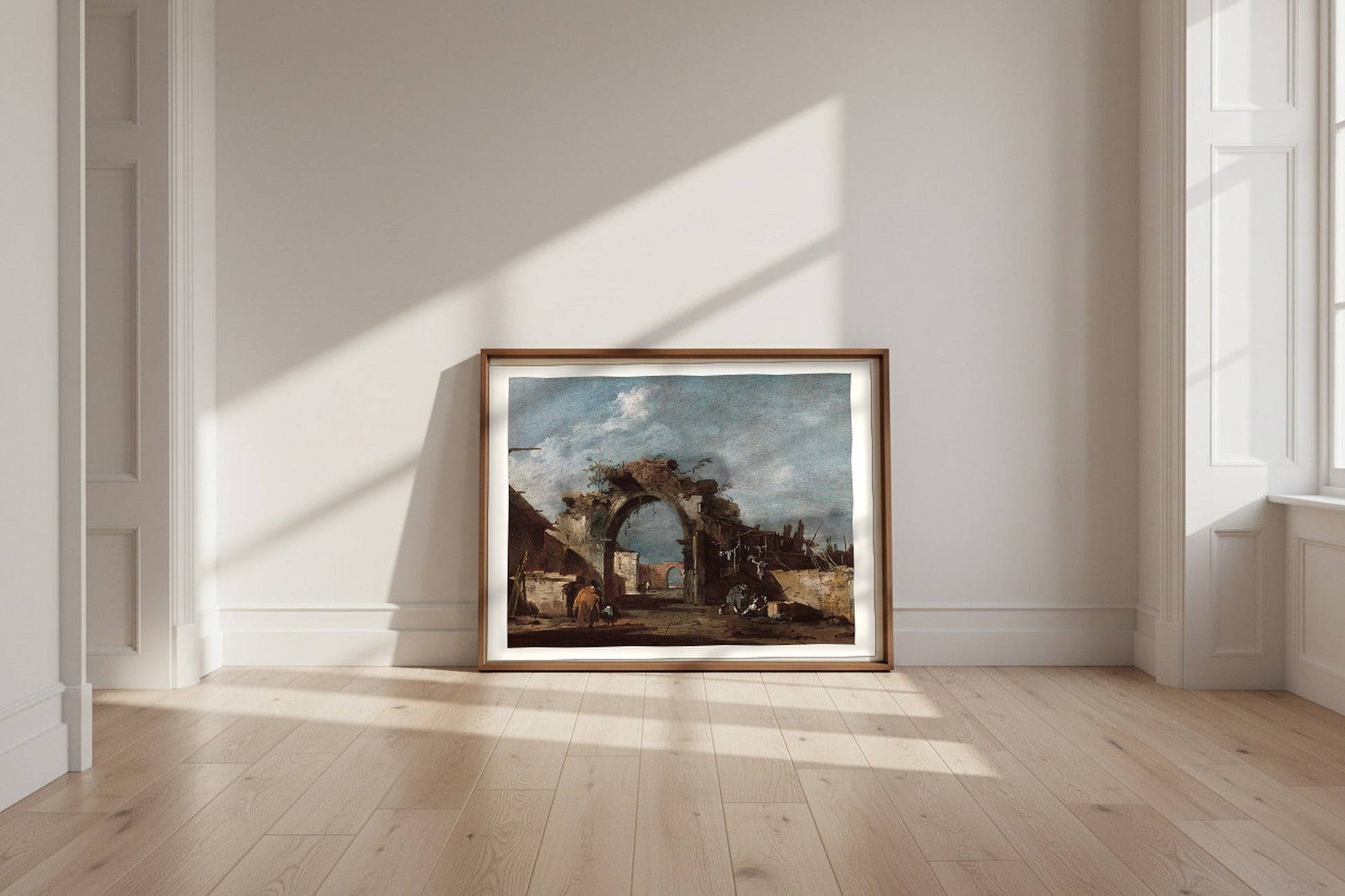 Ruined Archway — Francesco Guardi Fine Art Poster shown framed and leaning against a wall in a sunlit room