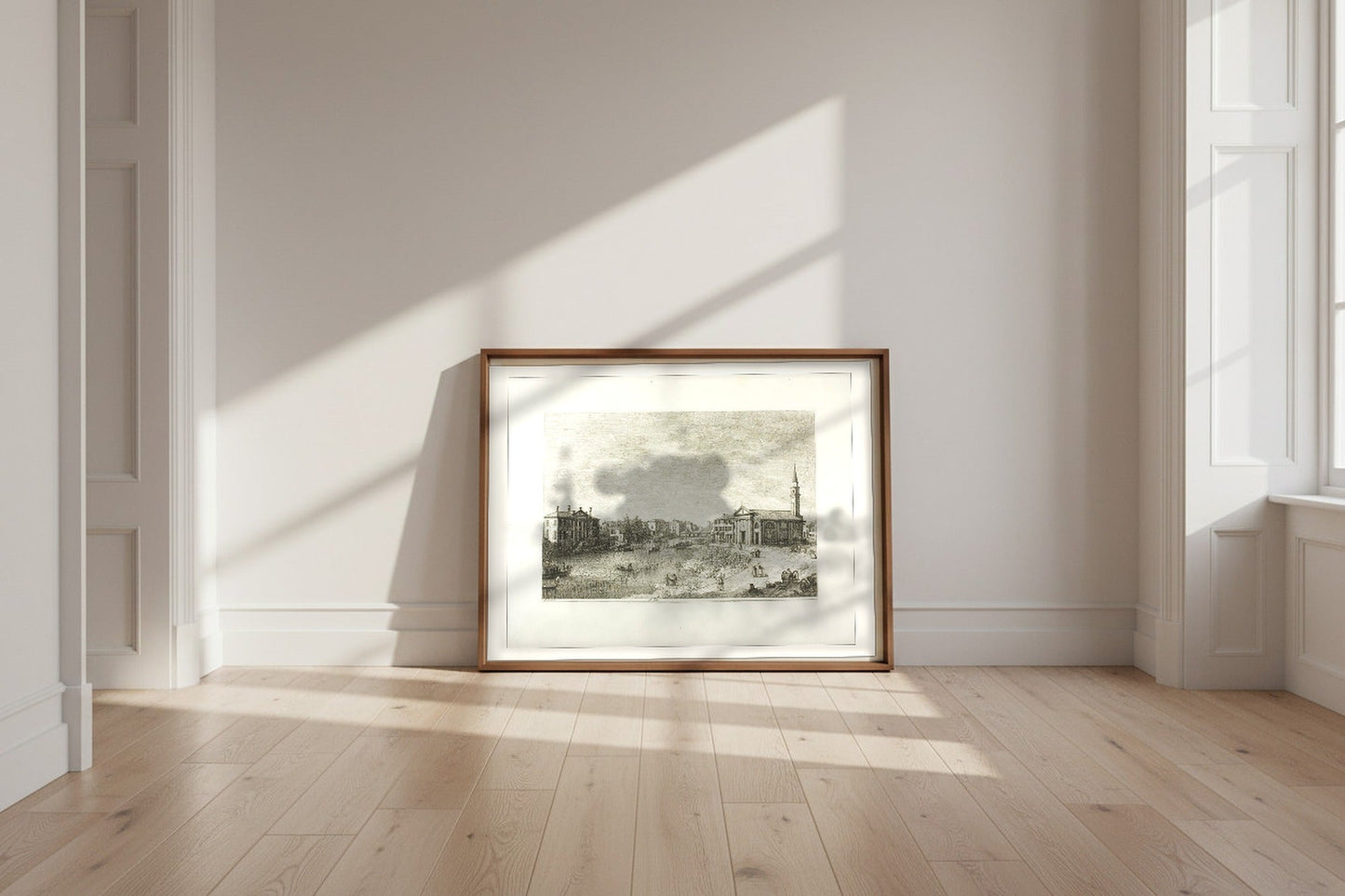 At Dolo — Canaletto Fine Art Poster shown framed and leaning against a wall in a sunlit room