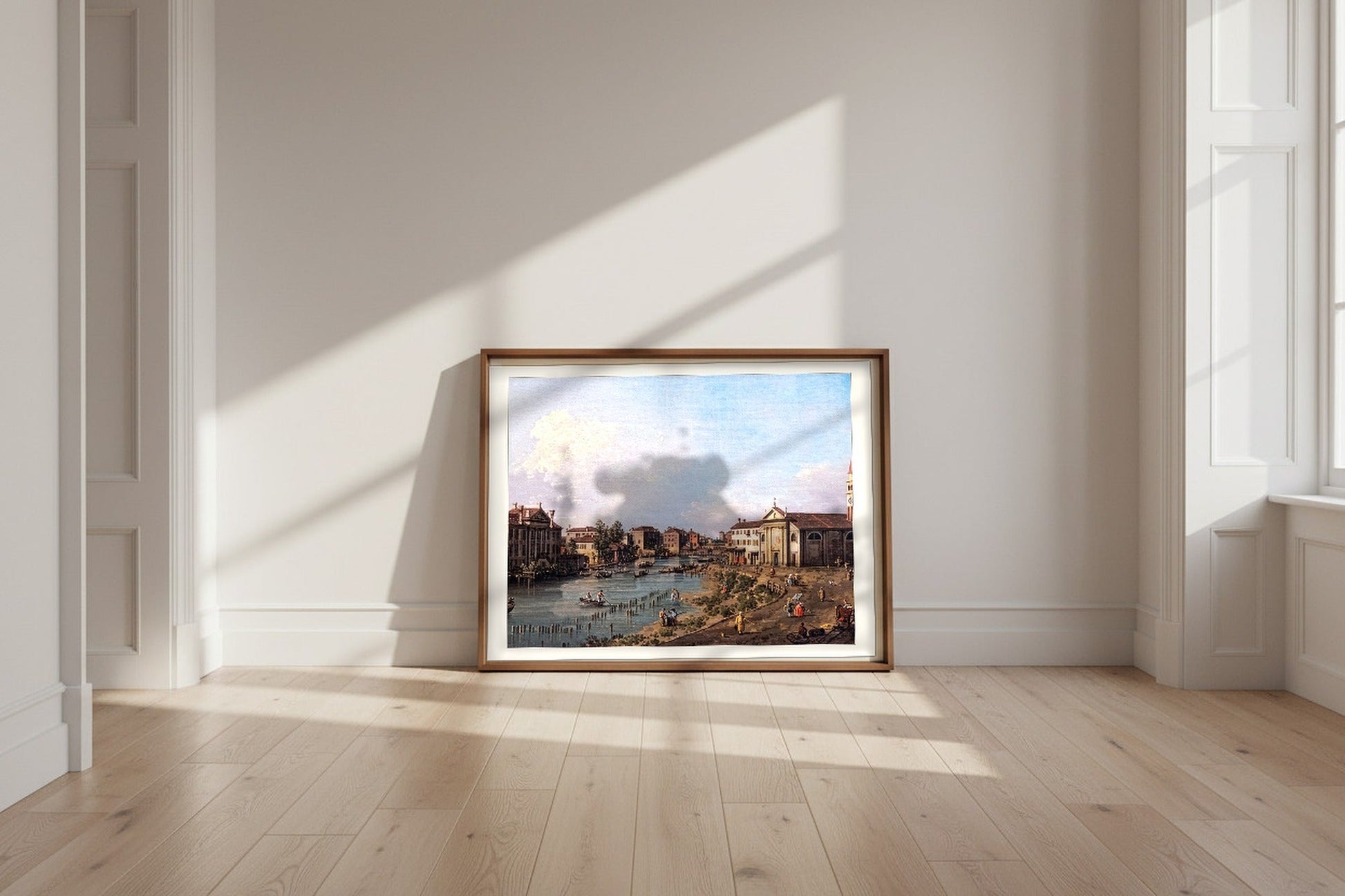 View of Dolo — Canaletto Fine Art Poster shown framed and leaning against a wall in a sunlit room