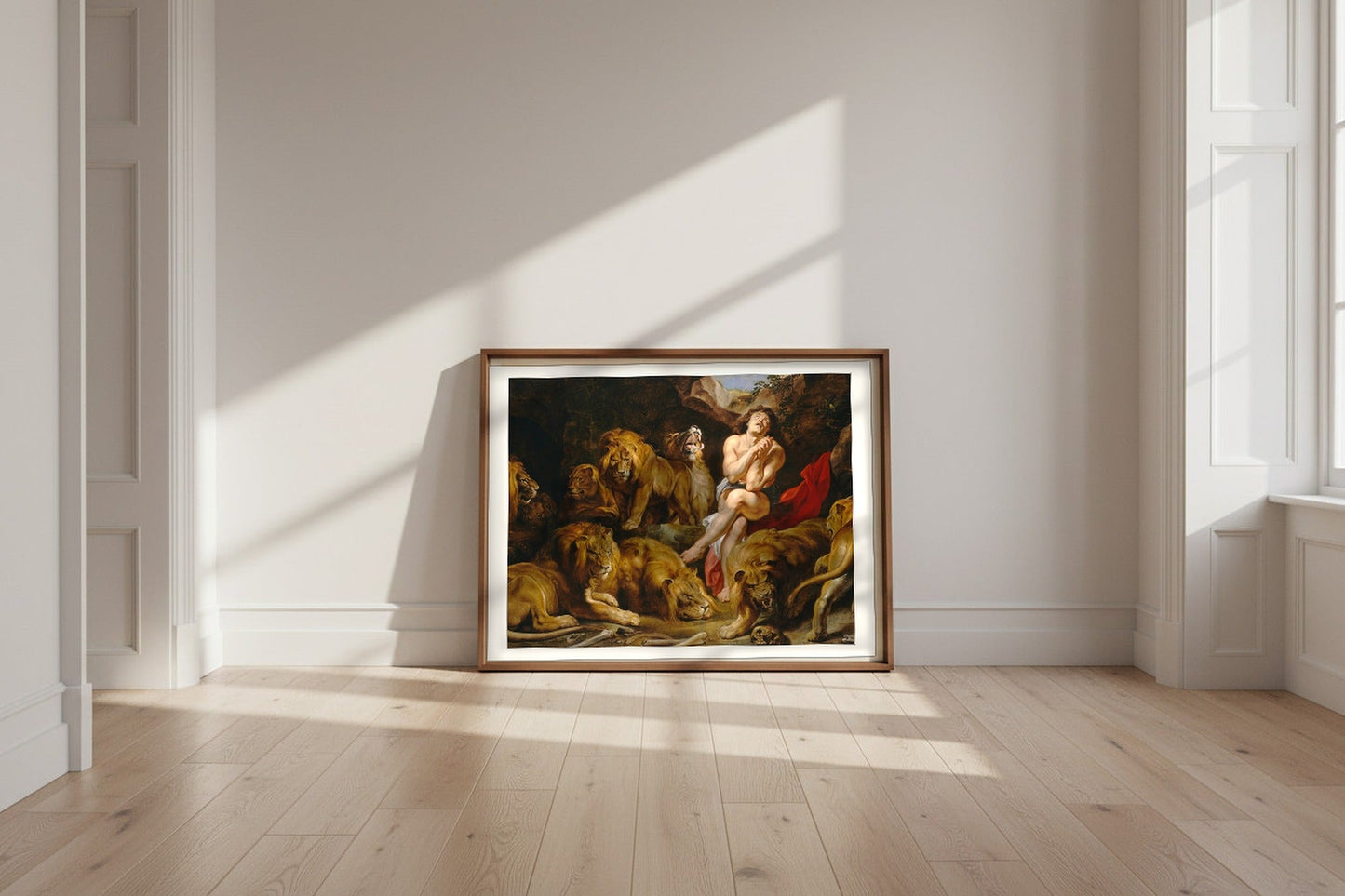 Daniel in the Lions' Den — Peter Paul Rubens Fine Art Poster shown framed and leaning against a wall in a sunlit room