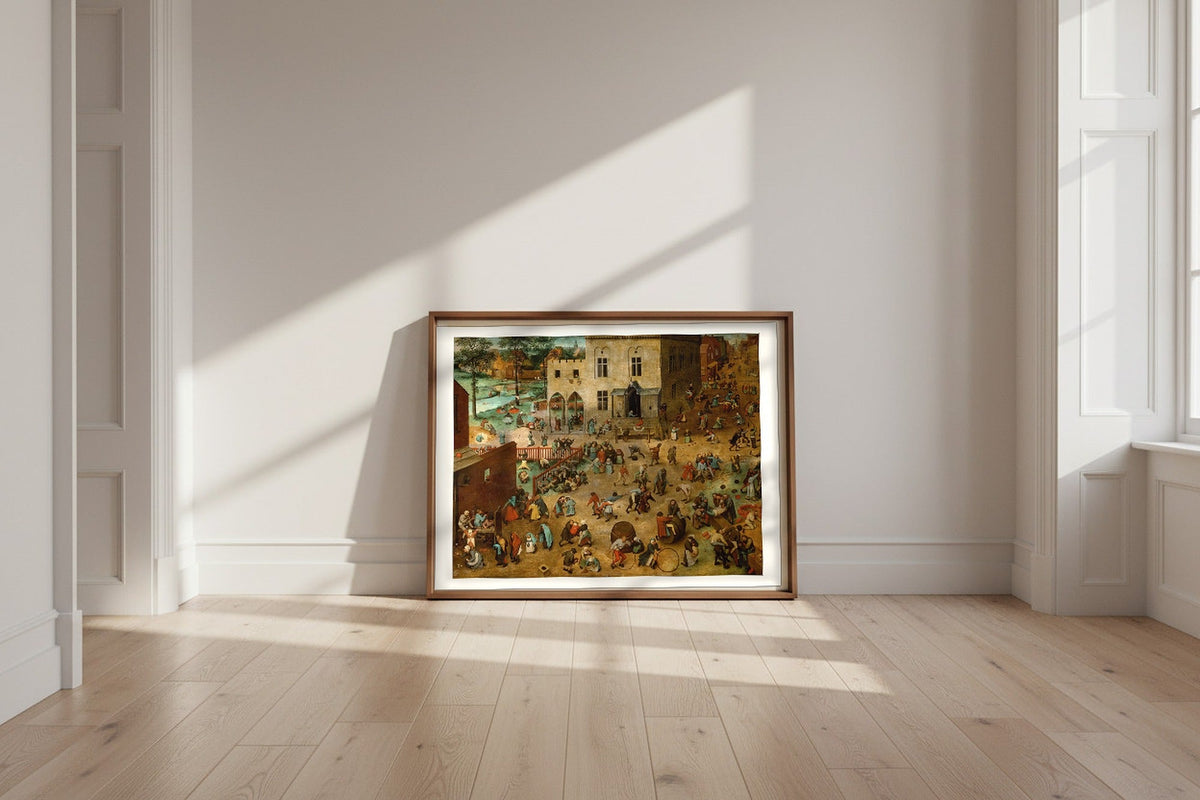Children's Games — Pieter Bruegel the Elder Fine Art Poster shown framed and leaning against a wall in a sunlit room