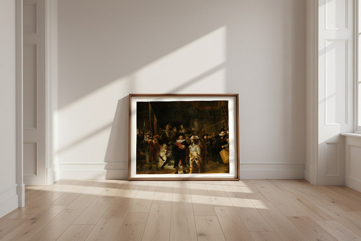 The Night Watch — Rembrandt van Rijn Fine Art Poster shown framed and leaning against a wall in a sunlit room