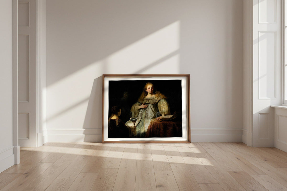 Judith at the Banquet of Holofernes — Rembrandt van Rijn Fine Art Poster shown framed and leaning against a wall in a sunlit room