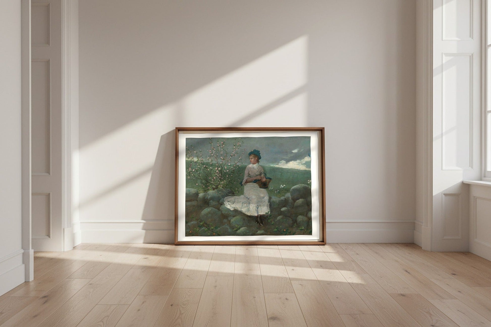 Peach Blossoms — Winslow Homer Fine Art Poster shown framed and leaning against a wall in a sunlit room