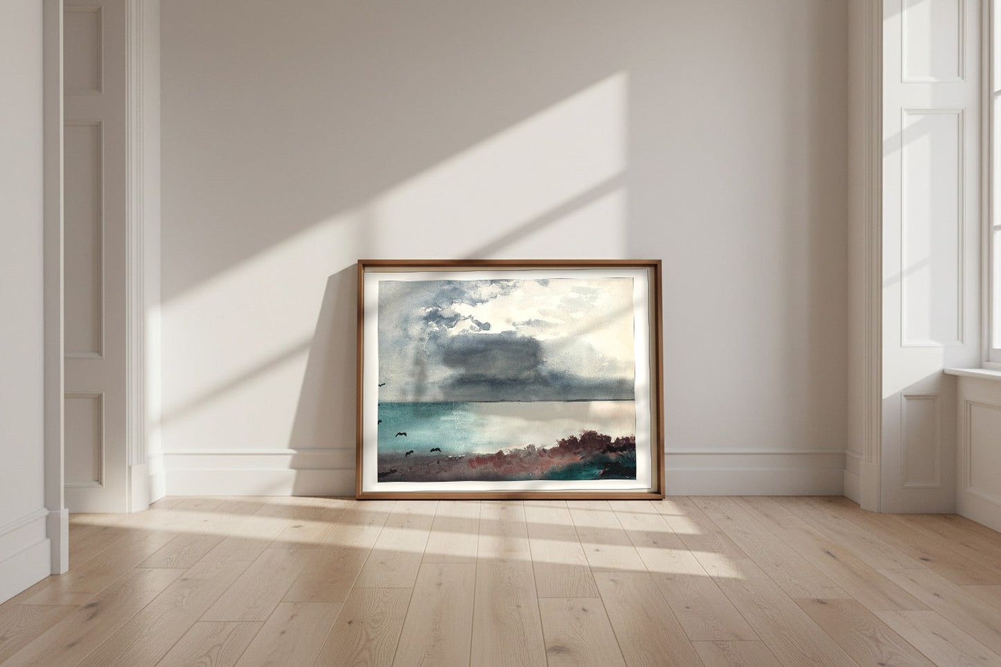 Breaking Storm, Coast of Maine — Winslow Homer Fine Art Poster shown framed and leaning against a wall in a sunlit room
