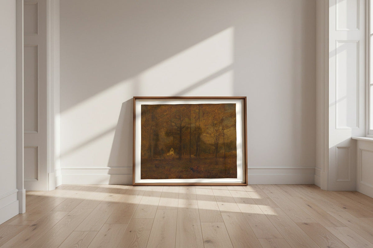 Autumn Woods — George Inness Fine Art Poster shown framed and leaning against a wall in a sunlit room