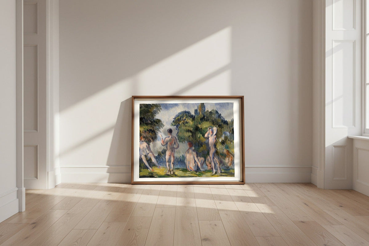 Bathers — Paul Cézanne Fine Art Poster shown framed and leaning against a wall in a sunlit room