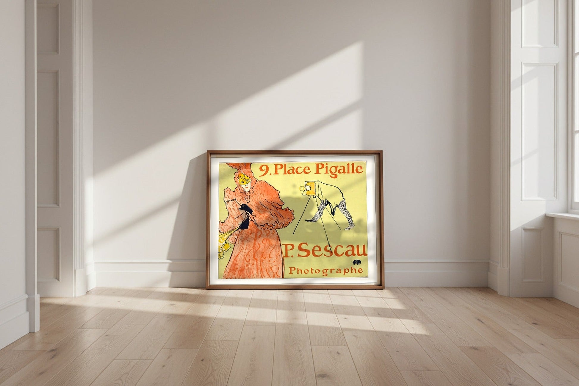 The Photographer Sescau — Henri de Toulouse-Lautrec Fine Art Poster shown framed and leaning against a wall in a sunlit room