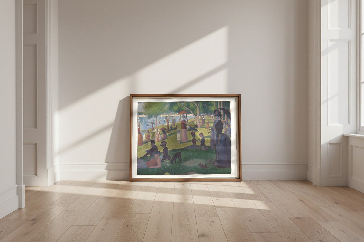 A Sunday on La Grande Jatte — Georges Seurat Fine Art Poster shown framed and leaning against a wall in a sunlit room