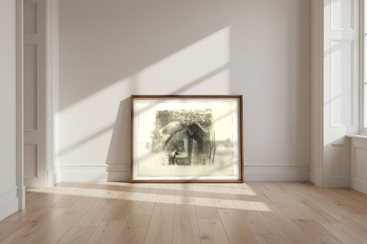 After the Bath (Large Version) — Edgar Degas Fine Art Poster shown framed and leaning against a wall in a sunlit room