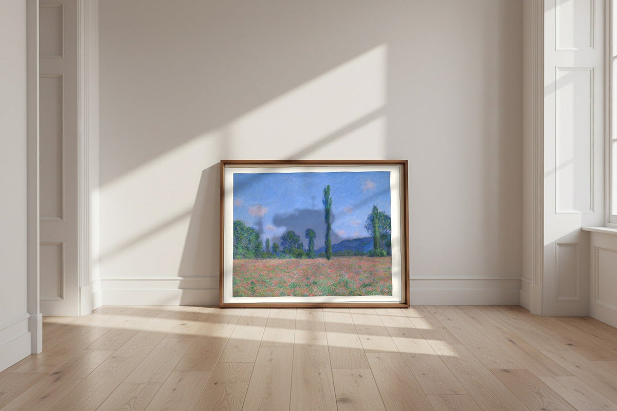 Poppy Field (Giverny) — Claude Monet Fine Art Poster shown framed and leaning against a wall in a sunlit room