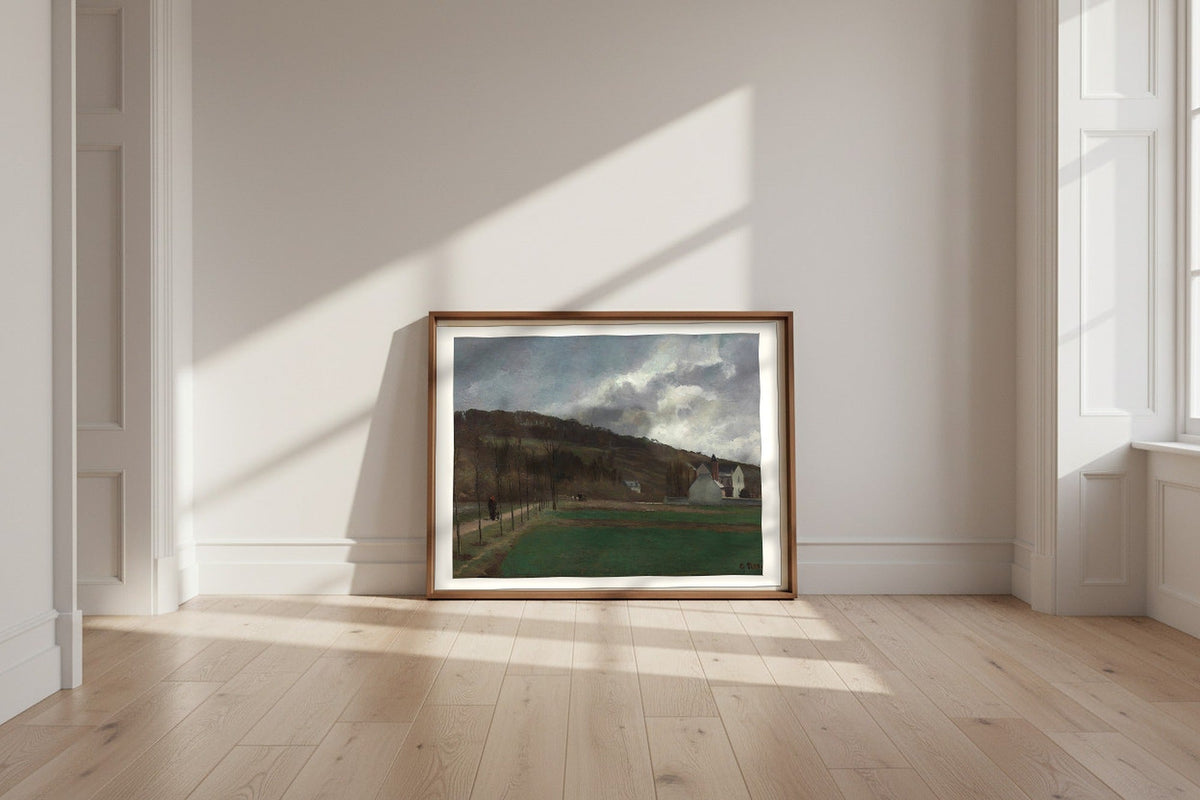 The Banks of the Marne in Winter — Camille Pissarro Fine Art Poster shown framed and leaning against a wall in a sunlit room