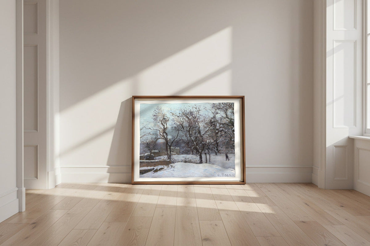 Snow at Louveciennes — Camille Pissarro Fine Art Poster shown framed and leaning against a wall in a sunlit room