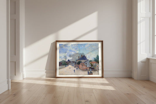 Street in Moret — Alfred Sisley Fine Art Poster shown framed and leaning against a wall in a sunlit room