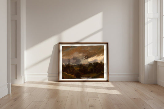 Hampstead, Stormy Sky (style of John Constable) Fine Art Poster shown framed and leaning against a wall in a sunlit room