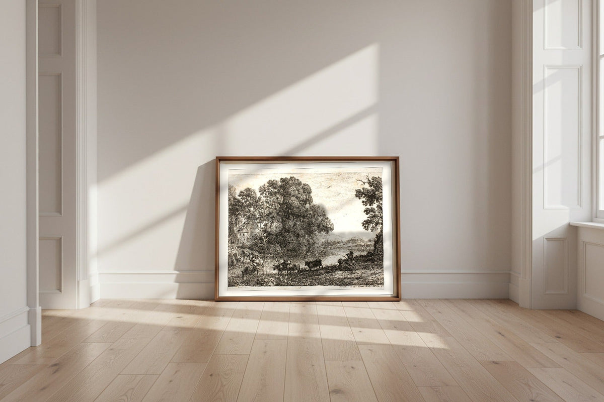 The Cowherd — Claude Lorrain Fine Art Poster shown framed and leaning against a wall in a sunlit room