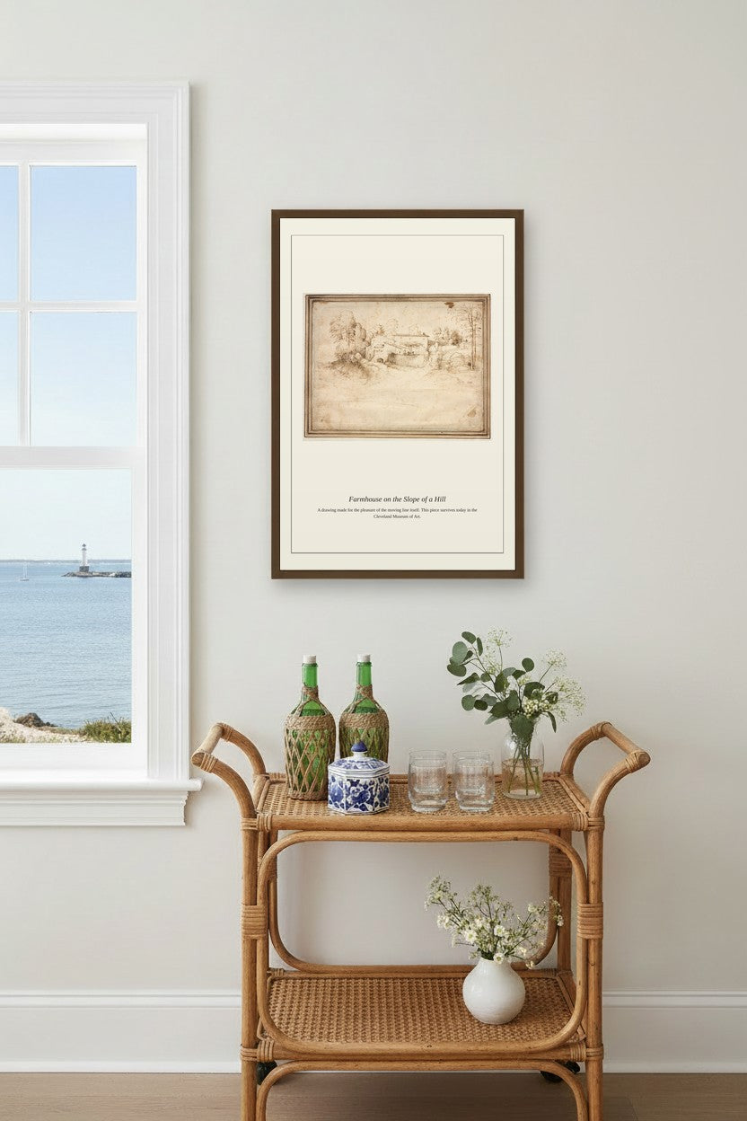 Farmhouse on the Slope of a Hill framed above a rattan bar cart beside a window with ocean view