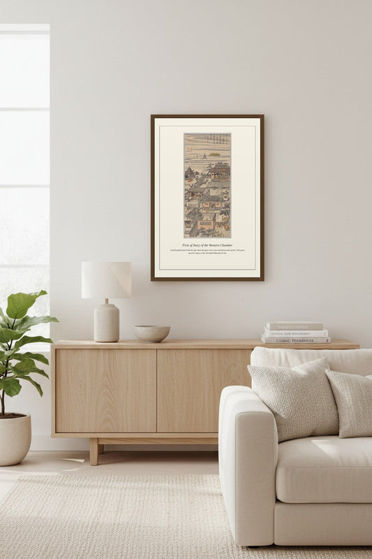 First of Story of the Western Chamber print framed above a white brick fireplace mantel