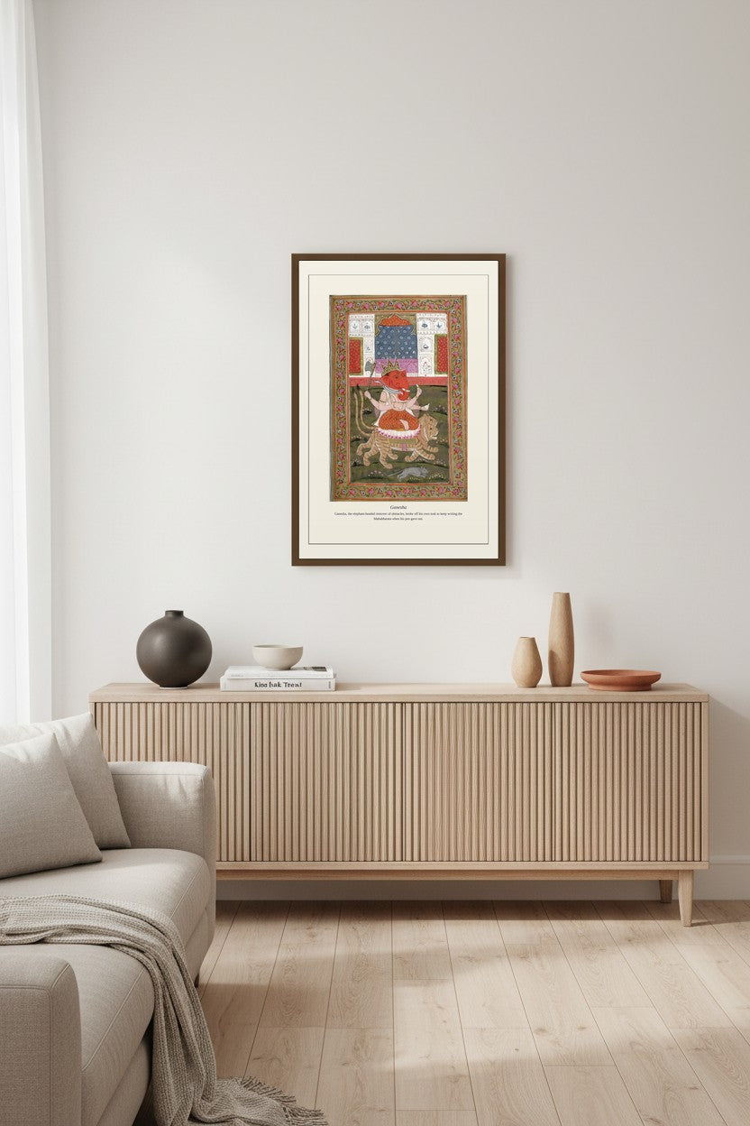 Ganesha Indian art print above a light wood sideboard with a cream sofa nearby