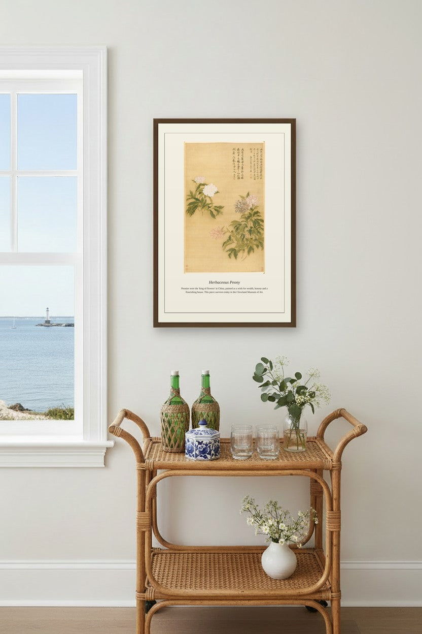 Herbaceous Peony framed above a rattan bar cart by a coastal window