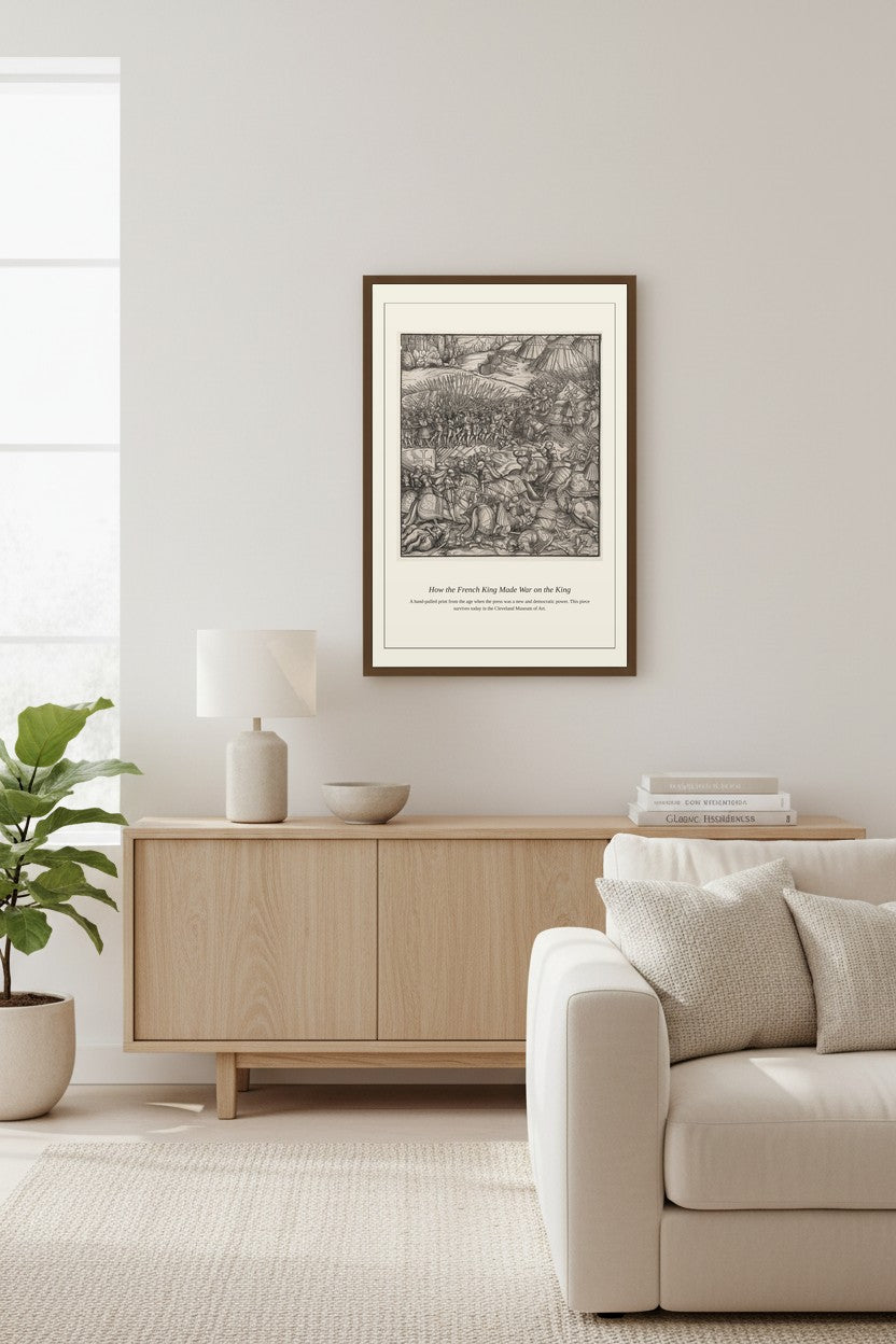 How the French King Made War on the King print framed above a wood sideboard in a soft-toned living room