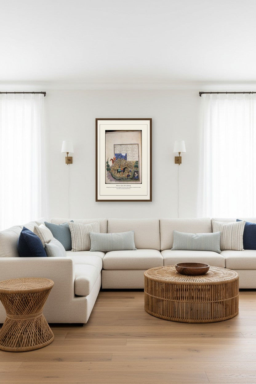 Khusraw Spies Shirin Bathing folio framed above a coastal-style sectional sofa with rattan table