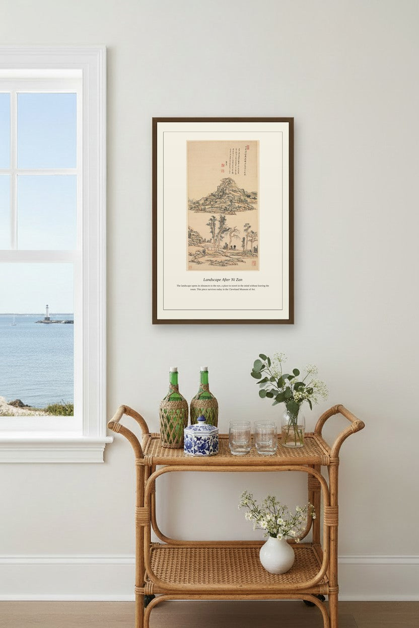 framed Chinese ink landscape scroll print above a rattan bar cart near a window overlooking the sea