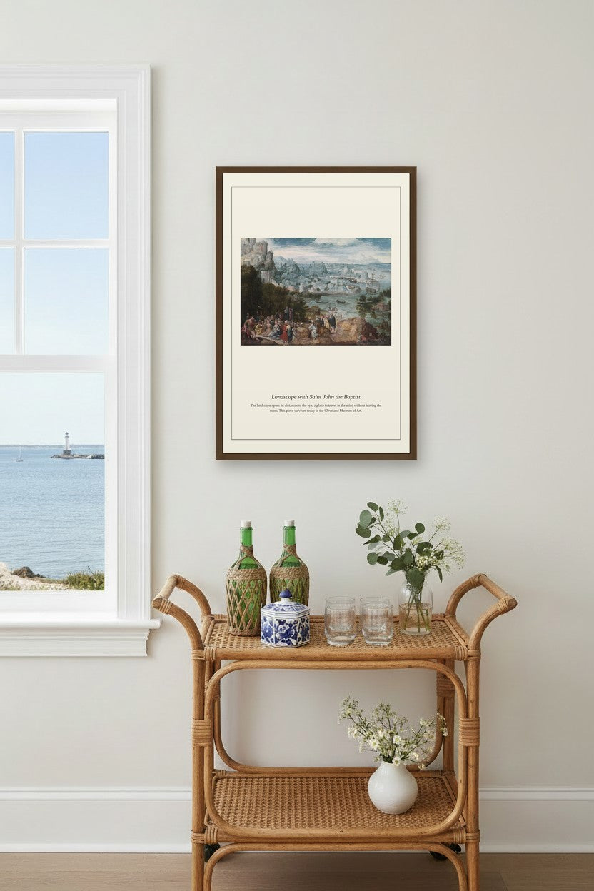 Landscape with Saint John the Baptist framed above a sofa in a bright living room