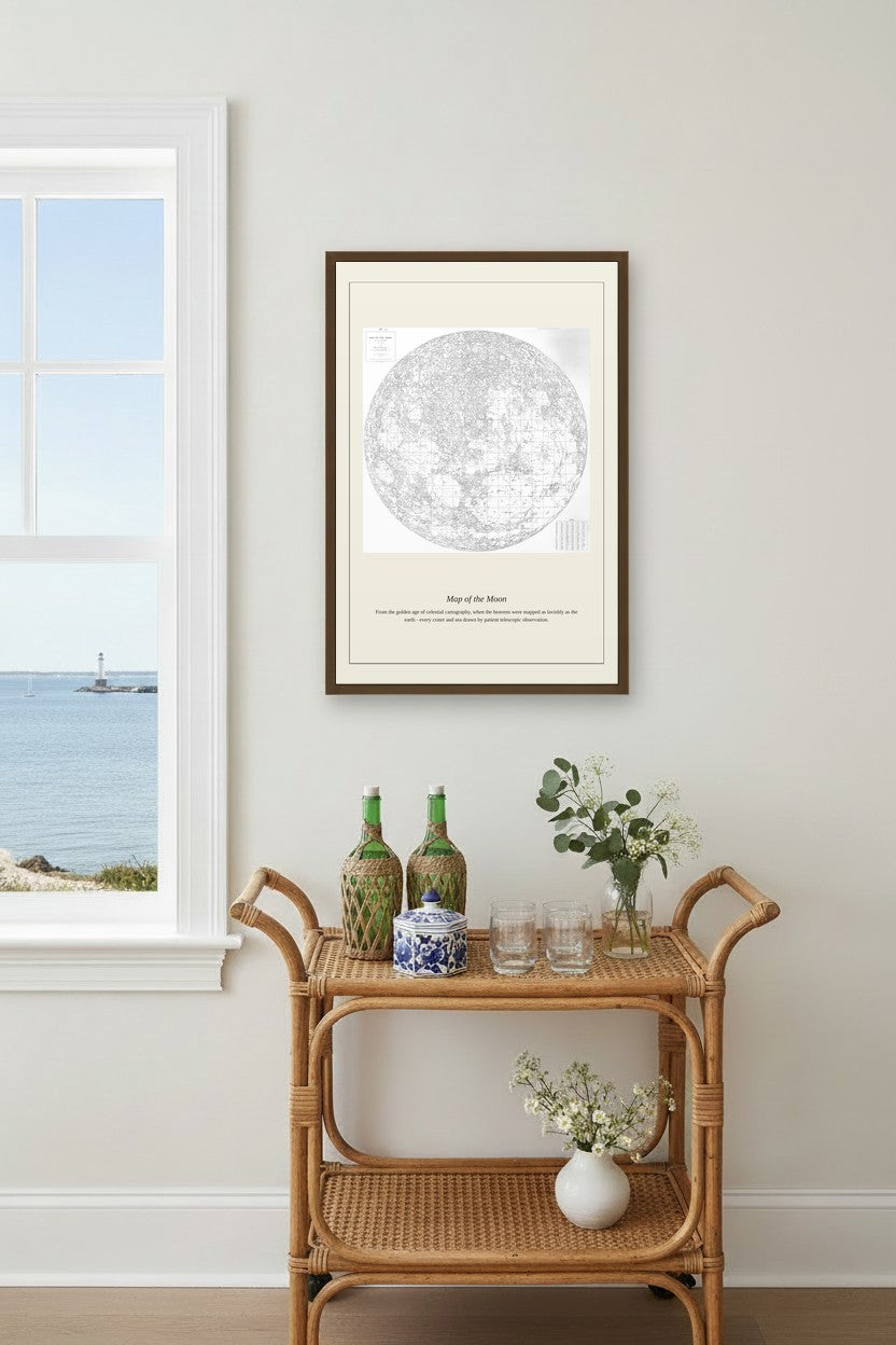 Map of the Moon chart above a rattan bar cart with a blue-and-white jar