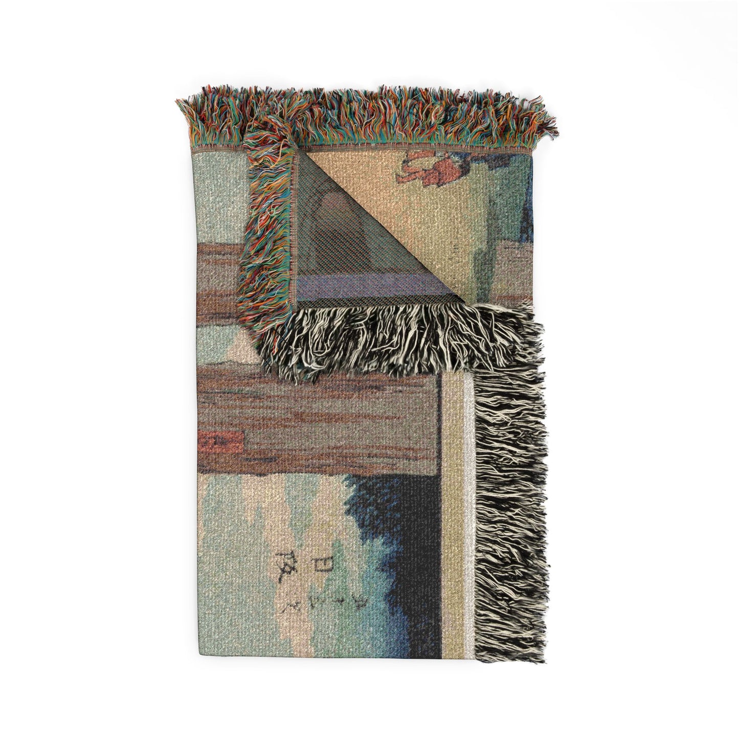 Nissaka Night-Weeping Stone throw blanket folded, beige woodblock front with dark sage reverse corner, colorful fringe detail