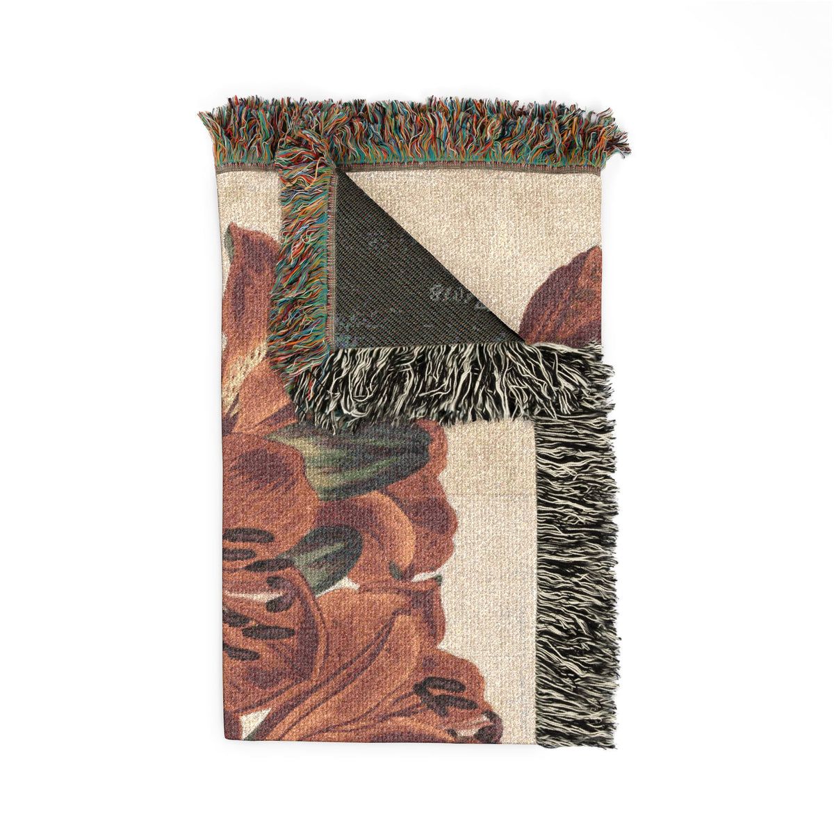 Orange-Lily Botanical blanket corner fold, orange-red lily petals and green leaf bud close-up, dark charcoal reverse, fringe