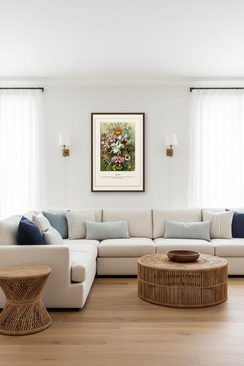 Orchids print framed above a white sectional sofa in a bright living room