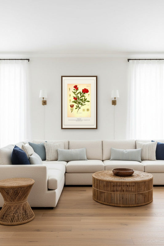Pomegranate print framed above a beige sectional sofa in a bright living room