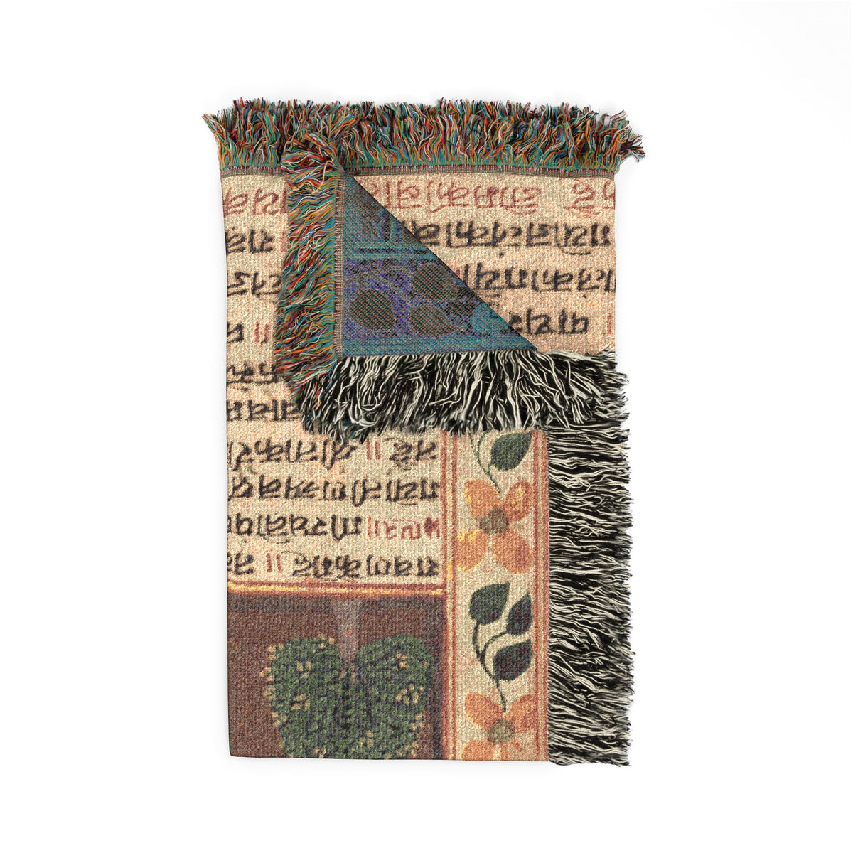 Ravana Jatayu blanket corner fold detail showing Sanskrit script text, blue reverse side, floral border, fringe edge