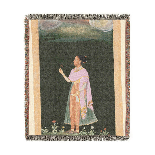 Royal Woman Holding a Flower Woven Throw Blanket flat lay, Mughal figure in pink robe on dark green, cream border, fringe