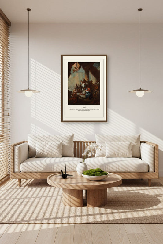 A framed art print featuring a classical painting of a shepherd and sheep hangs on a light beige wall above a modern wooden sofa in a sunlit living room.